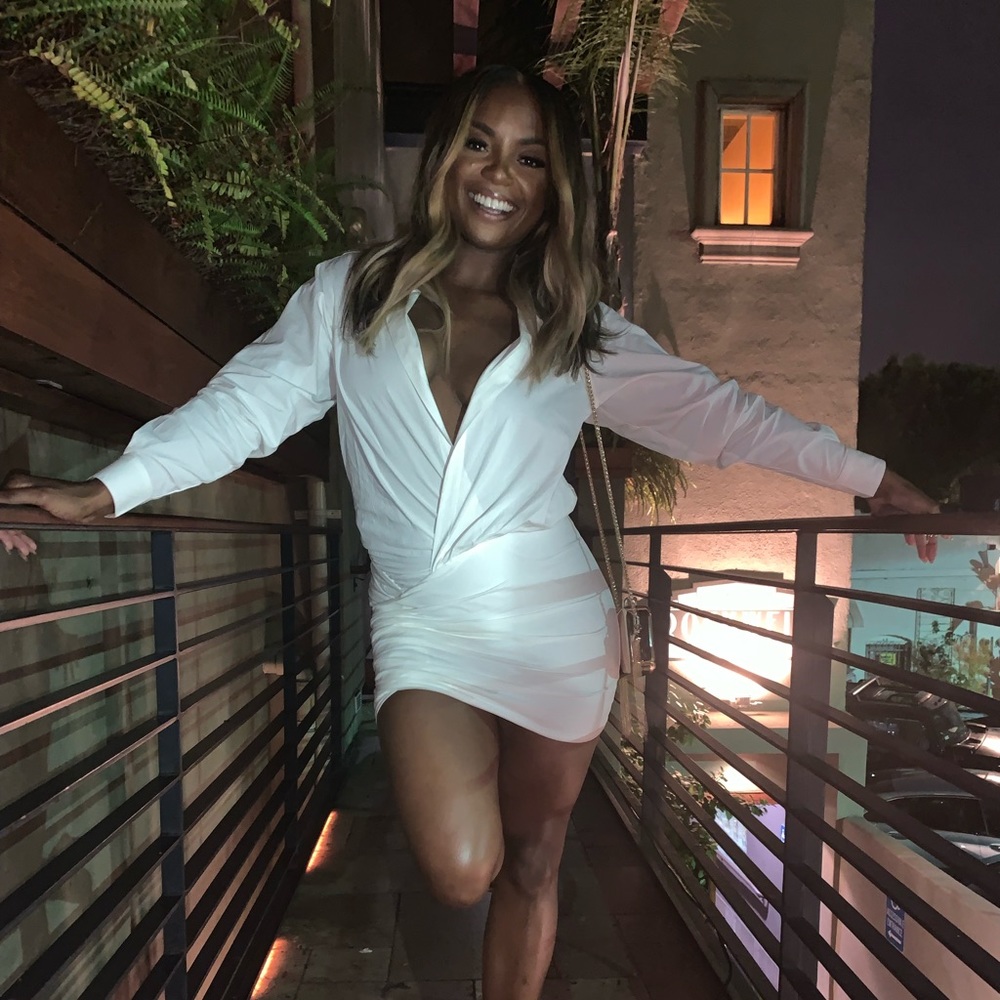 White fitted dress, good for any occasion.